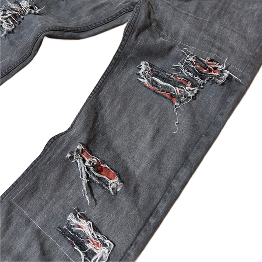 Reworked Slashed Jeans